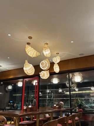 Paper lanterns over a restaurant.