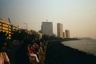 A seafront promenade at dusk.
